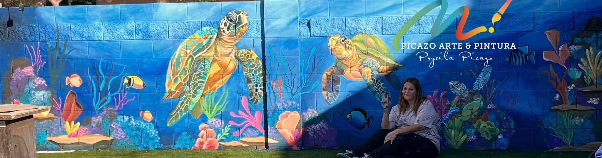 Two sea turtles, outdoor cinder block mural